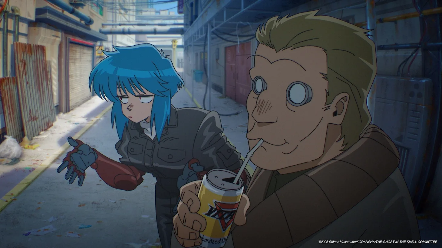 THE GHOST IN THE SHELL ATHE GHOST IN THE SHELL Anime Reveals Main Cast - A digital anime-style illustration depicts two characters in a narrow, gritty alleyway. In the foreground on the right, a large man with short blonde hair and distinct, circular mechanical cybernetic eyes sips from a straw stuck into a yellow aluminum can. He wears a brown jacket with a prominent, padded collar. Behind him and to the left, a woman with bright blue hair, wearing a dark jacket, looks toward him with an annoyed or questioning facial expression. Her left prosthetic robotic arm, colored red and grey, is extended outward with an open hand gesture. The background features a cluttered, industrial alley with pipes, corrugated metal sheets, and building walls under a bright blue sky.nime Reveals Main Cast - Crunchyroll News