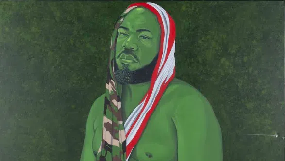 The damaged painting, “Man in the Garden” by the artist Clarence Heyward, was part of an exhibition called “Eden.”Credit...Houston Museum of African American Culture