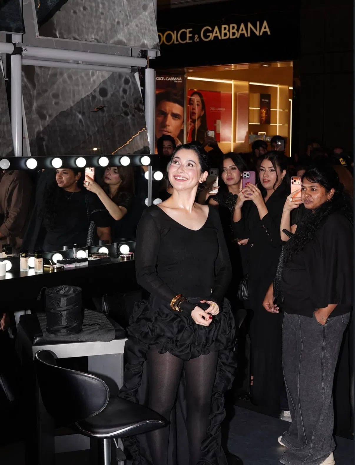 Hania Aamir’s headline-making appearance at the grand launch of Pakistan’s first-ever YSL Beauty store at Dolmen Mall in Lahore perfectly bridged the worlds of high fashion and global beauty retail. Styled by acclaimed fashion curator Aarinda Noor, the actress epitomised classic Parisian elegance mixed with modern edge, turning heads in a head-to-toe Yves Saint Laurent look. The centerpiece of her outfit was a magnificent silk gazar bubble cascade ruffled maxi skirt from YSL’s Fall '25 collection, which offered a dramatic yet fluid silhouette that moved beautifully with every step. She paired the statement skirt with YSL Madeline ruffled pumps, creating a cohesive, high-fashion narrative that paid direct homage to the luxury French house's design heritage. For accessories, Aamir opted for timeless luxury over flashy trends, sporting a classic Cartier Tank Française watch that added a clean, structural contrast to the soft ruffles of her attire. Her beauty look for the night remained true to her signature style—radiant, glass-like skin, soft, flushed cheeks, and a perfectly defined lip that subtly showcased the premium finish of YSL Beauty’s makeup range. As the star attraction of the "YSL Beauty Light Club" launch event, her presence instantly drove immense digital engagement, with videos and photographs of her look dominating Instagram and TikTok feeds across the region. The high-profile event drew a elite crowd of Pakistan's top digital creators, models, and fashion icons, all gathering to celebrate the brand's official brick-and-mortar entry into the Pakistani market. By aligning her personal brand with such an iconic global luxury label, Hania Aamir not only solidified her status as Pakistan's leading fashion trendsetter but also highlighted the growing global commercial appeal of Lahore's luxury retail landscape.