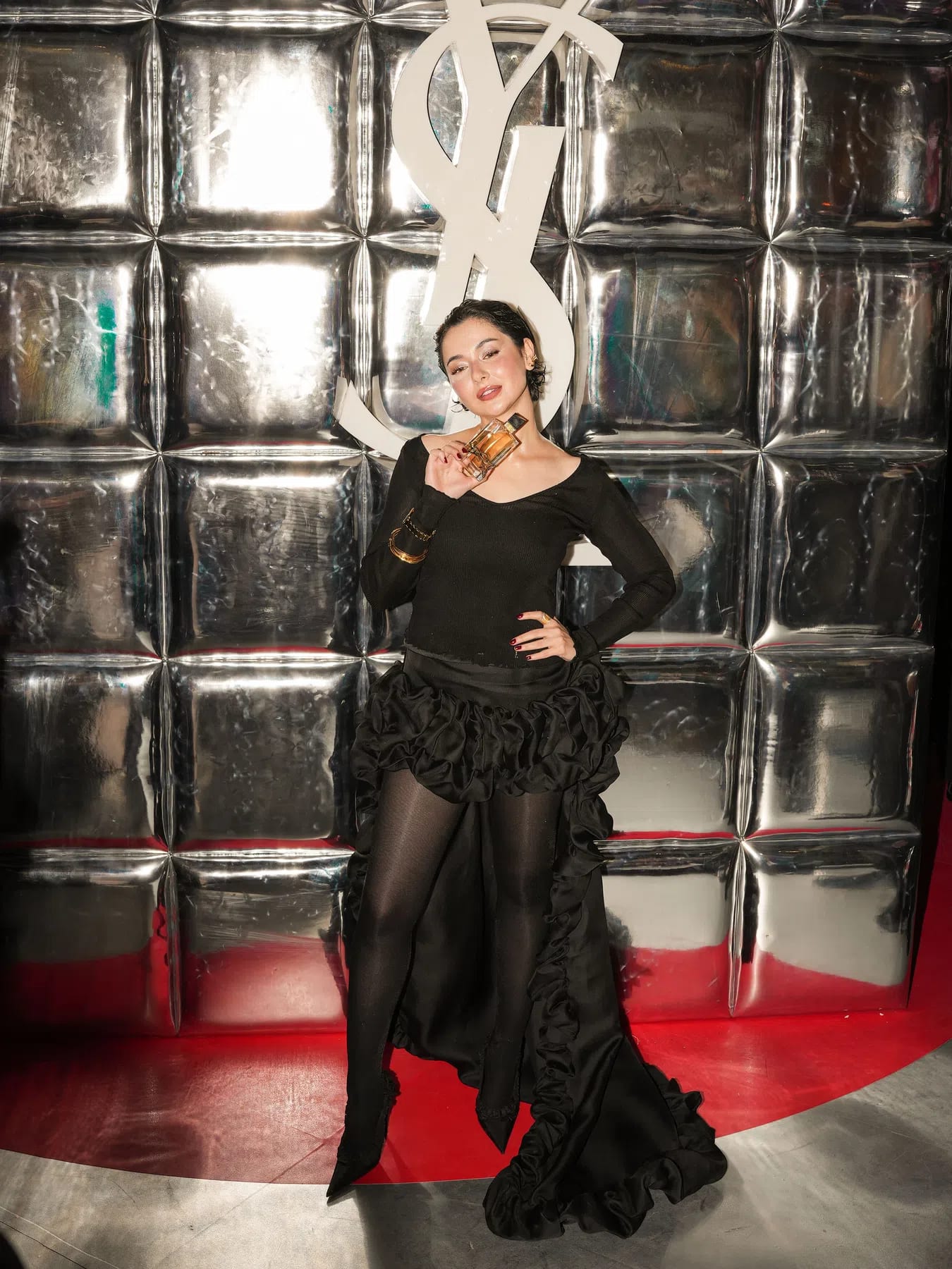 Hania Aamir made a striking appearance at the recent YSL Beauty launch, effortlessly blending modern glamour with her signature understated elegance. Representing a new wave of South Asian fashion icons, she arrived in a meticulously styled ensemble that reflected the refined aesthetic associated with the French luxury house. Her look featured a sleek silhouette, polished tailoring, and carefully coordinated accessories that elevated the outfit without overwhelming it. Soft, luminous makeup paired with a glossy nude lip and subtly defined eyes complemented the overall styling, while her neatly styled hair added a sophisticated finishing touch. Throughout the event, Hania carried herself with remarkable confidence, posing gracefully for photographers and interacting warmly with guests, reinforcing why she remains one of Pakistan's most influential celebrities in fashion and beauty. Social media quickly filled with images and videos from the launch, with fans praising her effortless charm, poise, and ability to make luxury fashion appear both aspirational and approachable. Her presence at the event also highlighted her growing international appeal, reflecting how Pakistani talent continues to gain visibility at prestigious global brand activations. Beyond the outfit itself, what stood out most was her confident demeanor and natural charisma, qualities that consistently distinguish her public appearances. The YSL launch became another milestone in her evolving fashion journey, demonstrating her versatility and strengthening her reputation as a style icon capable of representing internationally recognized luxury brands with grace, sophistication, and authenticity. 