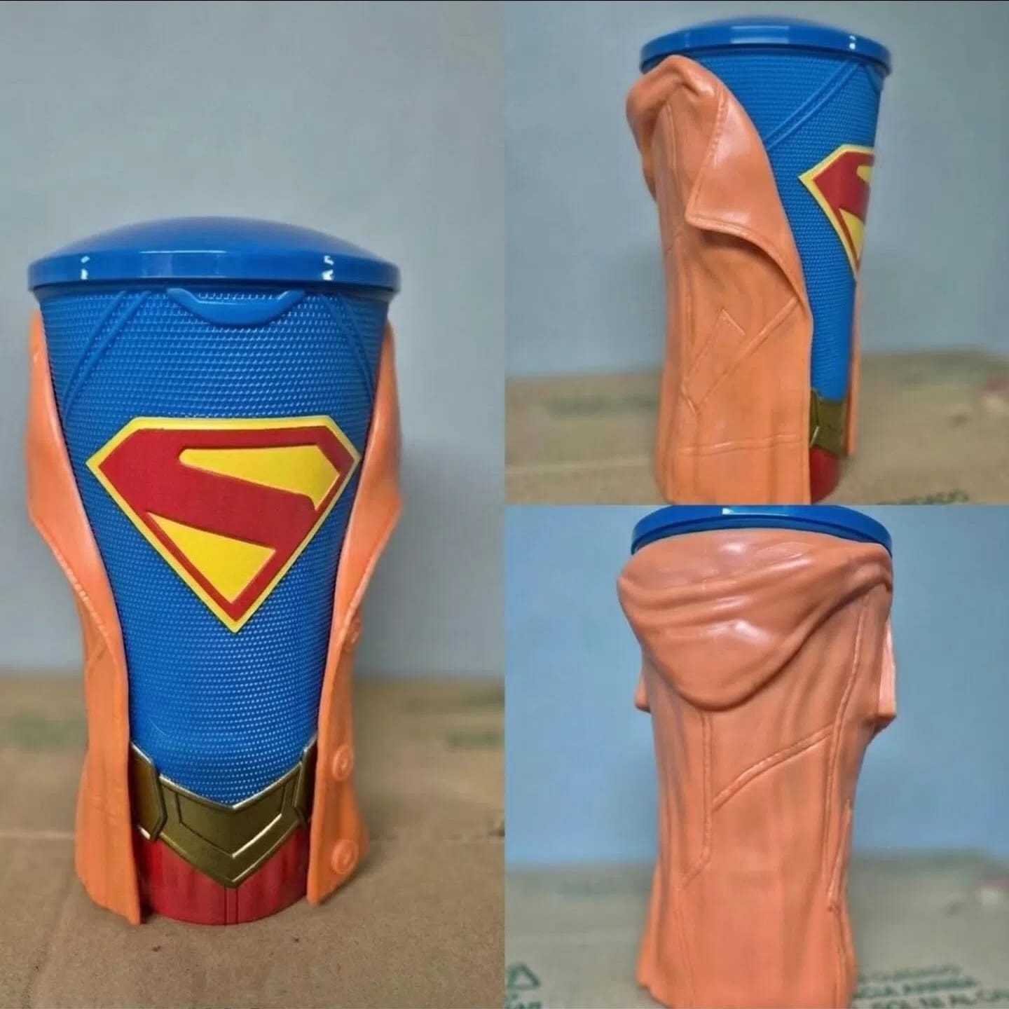 The promotional 3D drink cup released by the Mexican theater chain Cinépolis for the upcoming Supergirl movie has immediately gone viral for its highly bizarre and unintentional design. Constructed around a blue suit base and wrapped in a sculpted, flesh-colored trench coat pulled from the film’s promotional posters, the cup’s bunching fabric and top-folding hood heavily backfired on social media. Within minutes of the reveal, the internet mercilessly roasted the merchandise, pointing out that the folding colors and plastic textures unintentionally make the cup resemble a piece of male anatomy or an adult toy rather than heroic outerwear.