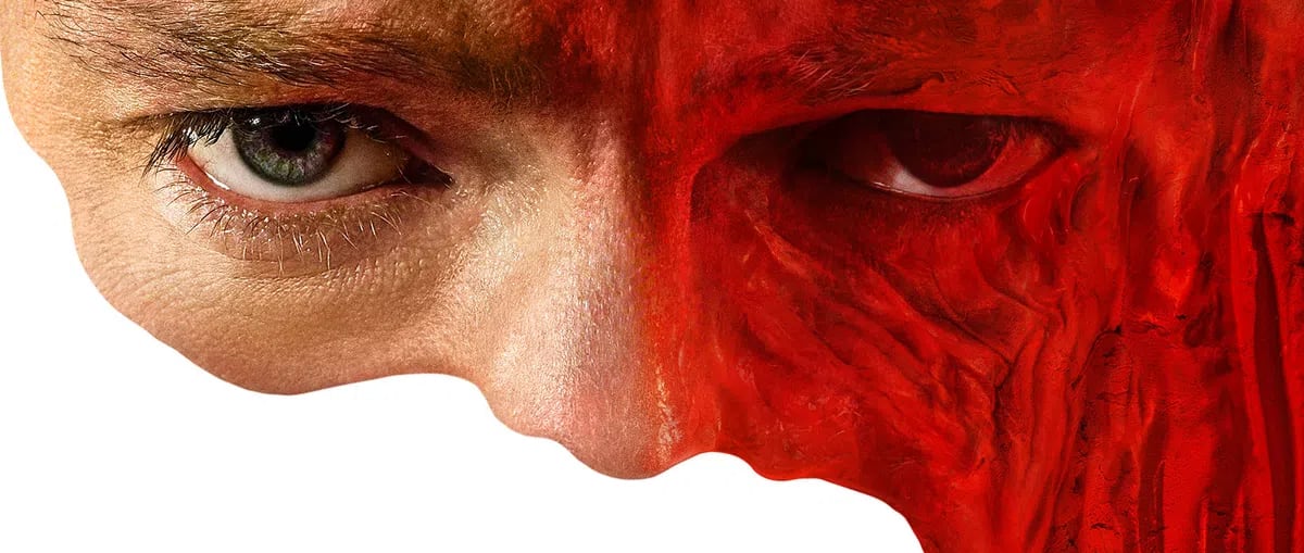 A striking movie poster for a film titled "Clayface" featuring a dramatic composition dominated by a large, close-up face split down the center. On the left side, a realistic human eye and smooth skin are visible, while the right side morphs into a swirling, textured, blood-red clay-like substance that forms a massive, gaping frame around the rest of the image. The title "CLAYFACE" is printed in a bold, stylized, red serif font in the center of the stark white background, accompanied by the tagline "LOOK FEAR IN THE FACE" above it and the "DC STUDIOS" logo. Below the title, the text reads "ONLY IN THEATERS" and "OCTOBER 23". At the bottom of the white space, a small, lone figure wearing a red hooded jacket and sunglasses stands amidst a jagged, miniature red cityscape formed by the swirling clay texture.