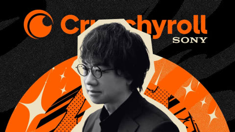 An artistic graphic featuring a stylized, grayscale portrait of Japanese anime director Makoto Shinkai against a vibrant orange and black background. Shinkai is positioned in the lower-center of the frame, facing slightly left, wearing round spectacles, a dark button-down shirt, and a blazer jacket. His portrait is cutout with a thick cream-colored border, layering it over a large orange circular graphic that dominates the bottom half of the image. This circular background is embellished with white, shimmering starburst sparkles and black, abstract architectural outlines reminiscent of cityscapes. Behind this entire composition, the upper section features the large, bold orange typography of the "Crunchyroll" logo, with a smaller, white "SONY" logo printed directly beneath the letters "roll." The topmost layer of the background contains a dark, textured pattern resembling stylized camouflage or abstract paint brushstrokes in shades of black and charcoal grey, completing the energetic and modern promotional design layout.