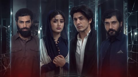A promotional poster for a television drama or movie features four characters arranged side-by-side in vertical panels against a dark, moody background with subtle reflections and cracked glass patterns. On the far left, a man with a thick black beard and intense gaze wears a brown button-up shirt. Next to him, a woman with a somber expression is dressed in a dark blue outfit with a light-colored shawl over her head, her hands clasped together near her chest. To her right, a young man with styled dark hair, an open white shirt, and a black jacket looks anxiously into the distance. On the far right, another bearded man in a dark navy blue vest and collared shirt looks forward with a serious demeanor. The lower portion of the image is shrouded in a hazy red fog, featuring a prominent, circular metallic seal engraved with an inverted five-pointed star (pentagram) containing a stylized goat head, reminiscent of occult or Illuminati symbolism.