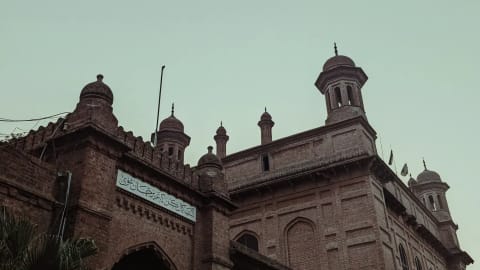 The National College of Arts (NCA) Lahore stands as Pakistan's premier, federally chartered public art university and the second-oldest art institution in South Asia. Founded in 1875 as the Mayo School of Industrial Arts to safeguard and document regional craftsmanship under the British Raj, the institution's pedagogical roots were deeply influenced by the global Arts and Crafts Movement. Its inaugural principal, British artist and curator John Lockwood Kipling, established a curriculum that uniquely fused traditional Punjabi and Mughal craft techniques with European perspective-drawing methods. This design-and-craft ethos crystallized architecturally in the college's historic campus on Mall Road. Designed by the pioneering master builder Bhai Ram Singh and constructed by the legendary engineer Sir Ganga Ram, the iconic campus features red-brick, Indo-Saracenic facades, protective verandas, structural arches, and ornamental chatris. The historic Kipling Block, whose foundation stone was laid in 1880, serves as a physical anchor directly adjacent to the Lahore Museum, which was originally curated alongside the school to provide students with raw reference material.Following Pakistan's independence, the facility underwent a radical modernization in 1958 under the guidance of its first Pakistani principal, Mian Barkat Ali. Restructured into the National College of Arts, the university successfully decolonized its curriculum by importing global design methodologies and integrating experimental, non-conformist practices. Today, the institution organizes its academic scaffolding across the faculties of Art, Design, Architecture, Film & Television, and Performing Arts. It accommodates diverse specializations ranging from traditional Miniature Painting and Ceramic Design to contemporary Musicology and Visual Communication Design. Entrance is exceptionally competitive, drawing talent nationwide via a strict, multi-tiered provincial quota system, written testing, and rigorous live drawing examinations. This immersive, studio-centric cultural melting pot has birthed generations of visionary changemakers. Its alumni include modern art pioneers like Zahoor ul Akhlaq and Salima Hashmi, alongside prominent contemporary cultural icons like Ali Zafar and Ayesha Omar. Expanding its national reach, NCA also hosts specialized satellite campuses—including its Rawalpindi Campus and the newly inaugurated Gilgit-Baltistan Campus—solidifying its role as a monumental pillar of artistic scholarship, creative freedom, and cultural preservation across the region.