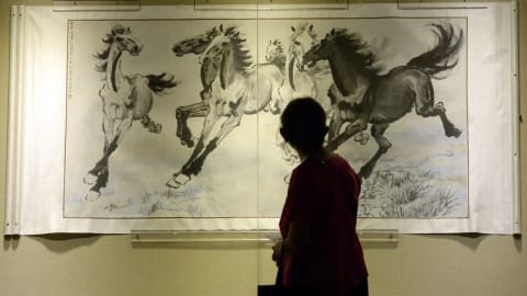 "Six Galloping Horses," painted in 1942, is one of the most iconic ink-wash masterpieces by the late Chinese master Xu Beihong. Seamlessly merging traditional Chinese brushwork with Western techniques of perspective and anatomy, the painting is permanently housed at the Xu Beihong Memorial Museum in Beijing.Historical Significance:Patriotic Symbolism: Created during World War II, Xu's horses were meant to embody unyielding boldness, resilience, and the untamed spirit of the Chinese people during the War of Resistance Against Japanese Aggression.Brushwork & Style: The piece captures horses in full flight utilizing strong, simple, and vigorous brush strokes with minimal outlines to depict nuanced postures and vivid expressions.Where to Experience His Art in Beijing:Xu Beihong Memorial Museum (located in Beijing): The primary institution dedicated to his life and works. The museum occasionally rotates its collection and offers commemorative merchandise and displays of his personal calligraphy and seals.Special Exhibitions: Curated exhibits featuring this masterpiece and other works are intermittently hosted at notable local galleries and cultural venues across the city, such as recent displays at the Financial Street Shopping Center.
