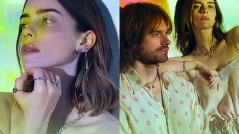 A side-by-side composite photo featuring American musicians Billie Eilish and Finneas O'Connell modeling a sustainable luxury jewelry collection. The left side is a close-up profile shot of Billie Eilish with her head tilted upward, leaning her chin on her hand, wearing delicate sterling silver and lab-grown diamond stud earrings, a long drop chain earring, a silver choker-style necklace, and several silver bands on her fingers. The right side features a broader mid-shot of the sibling duo posing closely under a colorful, abstract light projection; Finneas looks slightly away to the right while wearing a patterned, cream-colored open button-down shirt and a silver chain necklace, while Billie leans against his shoulder in a silk and lace lingerie top, layered silver necklaces, a silver bracelet, and several silver rings. Grammy-winning siblings Billie Eilish and Finneas expand their partnership with John Hardy by co-designing two new distinct jewelry motifs, Wildflower and Screwball, f