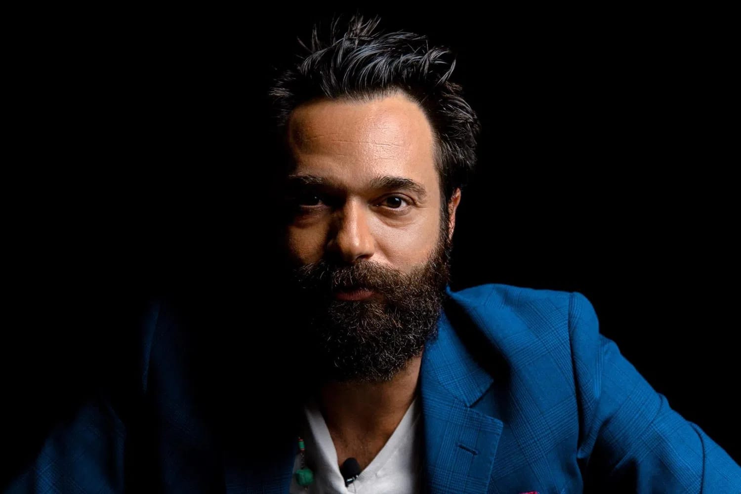 Sacha Jafri is a contemporary British visual artist celebrated for his large-scale, high-energy paintings that blend abstract styles with raw human emotion, a process he creates during intensely focused, meditative states he calls "magical realism". Born in London in 1977 to a prominent diplomatic family with Indian-Pakistani, French, and Iranian roots, he attended Eton College with Prince William and earned his Master of Fine Arts from Oxford University before rising to global fame for his record-breaking charitable projects. He achieved international acclaim—and a Guinness World Record—for creating "The Journey of Humanity," a 17,000-square-foot canvas painted in isolation over seven months at Dubai's Atlantis, The Palm, which sold at auction in 2021 for a historic $62 million to benefit children's charities like UNICEF and UNESCO. A fierce advocate for human empathy who strictly rejects digital and AI-generated art, Jafri tightly controls his exclusive art market by turning down 99% of prospective buyers, yet his physical masterpieces are heavily collected by high-profile figures including Barack Obama, Bill Gates, and Leonardo DiCaprio, while his creative ambitions have expanded into high-end collaborations, such as custom-designed Rolls-Royce Phantoms, and historic space initiatives, like sending his artwork onto the surface of the moon.
