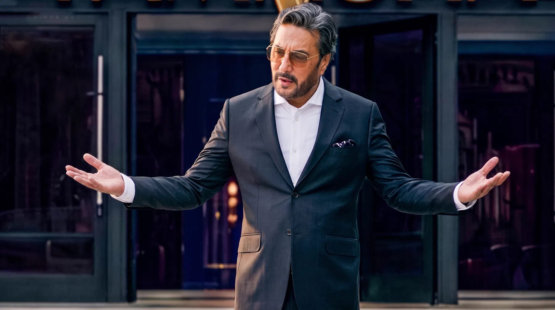 Tamasha Season 5, Pakistan's hit reality television show based on the Big Brother format, officially premiered on Saturday, 8 August 2026 on ARY Digital with veteran actor Adnan Siddiqui returning as the host ("Badshah"). The newly designed Tamasha Ghar welcomes a diverse lineup of 18 celebrity contestants—including veteran film stars Laila and Babrik Shah, alongside Saqib Sumeer, Samiya Hijab, Yasir Alam, Sahrish Ahmed, Fasih Khalid, Esra Ayesha, Maysam Hussain, Zayb Khan, Iman Lakhani, Dr. Zee Khan, Rabia Javaid Sheikh, Jay Kadn, Ramsha Salahuddin, Hamza Joher, King Hassan, and Kubra Eshaq—who will compete over several weeks under constant camera surveillance while taking on intense daily tasks and strict household rules. Viewers can watch the high-drama daily episodes from Sunday to Friday at 10:00 PM, catch the crucial elimination specials every Saturday at 9:00 PM, or stream the unfiltered action live 24/7 through the ARYPlus app and official digital channels.
