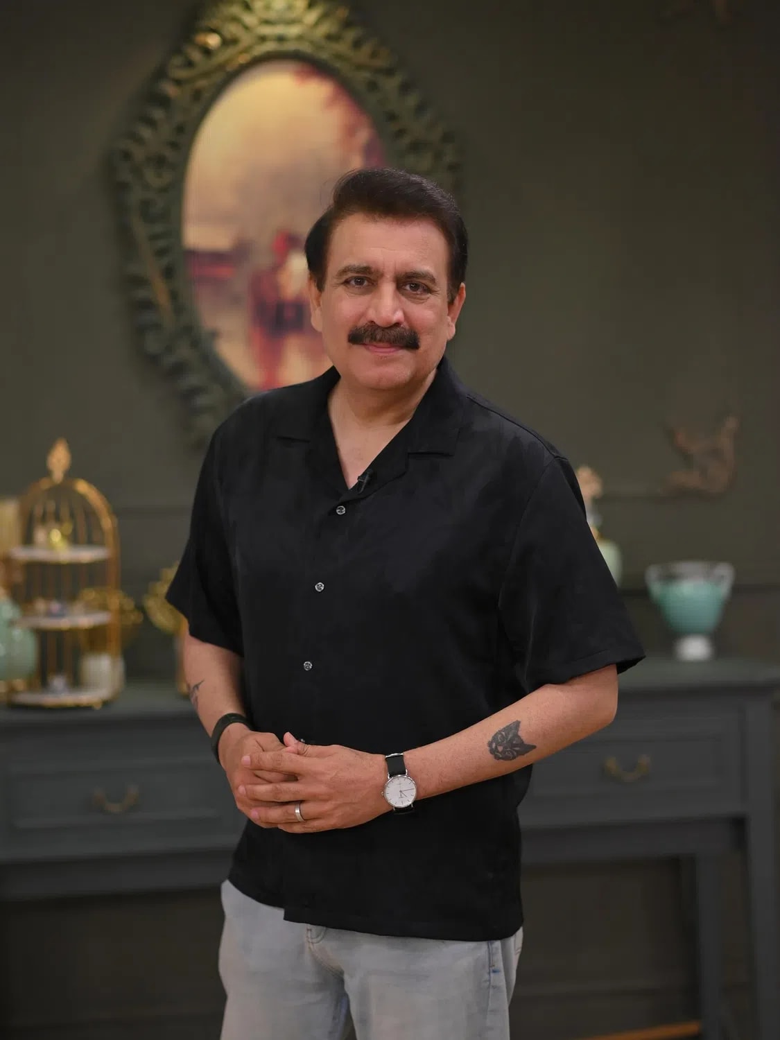 Tauseeq Haider is a veteran Pakistani radio and television anchor, show host, media executive, and actor who holds the historic distinction of being the first voice ever broadcast on FM Radio in Pakistan. Born on 19 February 1970, he launched his broadcasting career at the age of 17 as an English newscaster for Radio Pakistan and has since anchored major television programs, including his role hosting the morning show Rising Pakistan on PTV Home. Beyond his presentation career, he is a prominent media entrepreneur who founded the production house Black Box Sounds in 2005 and has directed documentary projects like The Story of a Banyan Tree. After a decade-long hiatus from television acting, he made a major, critically acclaimed comeback by portraying a beloved father figure in the blockbuster drama serial Kabhi Main Kabhi Tum alongside Fahad Mustafa and Hania Aamir. Known for his candid public commentary, he frequently speaks out on social issues, champions domestic cultural productions over imported foreign media, and recently used his platforms to humorously debunk viral, AI-generated wedding rumours regarding him and fellow host Farah Sadia.