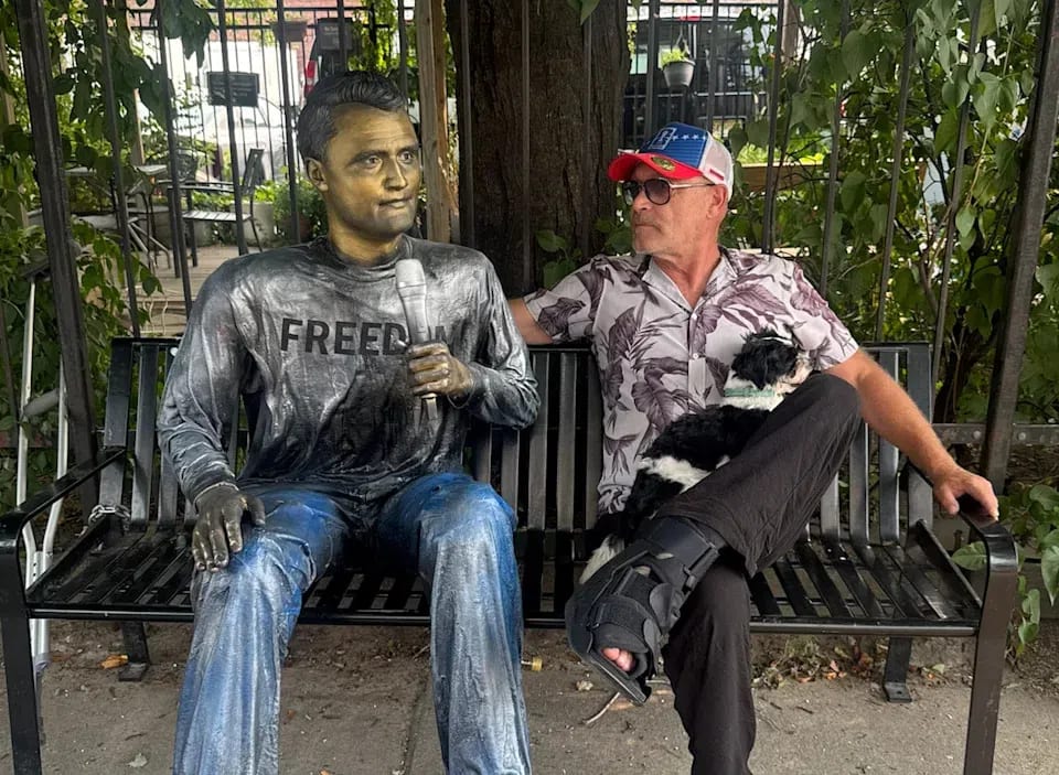 The 6-foot-4-inch uncommissioned memorial sculpture of the late Turning Point USA co-founder Charlie Kirk, handcrafted by Queens-based Italian artist Sergio Furnari out of metal and resin, is scheduled for a public unveiling in New York City's Times Square on September 10, 2026, at 2:23 PM to mark the exact one-year anniversary of Kirk's death. Intended by Furnari to serve as a "freedom statue" celebrating free speech, open dialogue, and political bravery, the monument depicts Kirk seated while holding a microphone to mirror his final public appearance at Utah Valley University. However, the project faces severe financial and logistical hurdles, as Furnari claims to have spent roughly $100,000 of his own money—even selling his apartment to keep the project alive—while his GoFundMe crowdsourcing efforts have struggled, raising less than $8,000 of a $150,000 goal. Beyond financial strain, the independent installation has ignited intense public polarization and online backlash across platforms like X and Instagram, with critics fiercely questioning the monument's aesthetic merit, its relevance to a politically progressive New York City, and its legal status as an unapproved public installation, leading many to predict that the sculpture will face immediate municipal removal or public defacement upon its arrival.